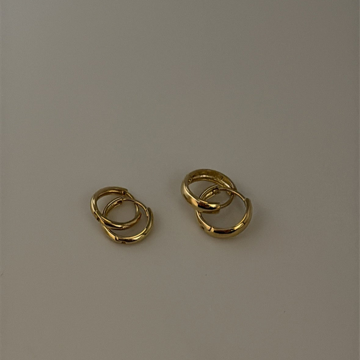 14k Huggies earring