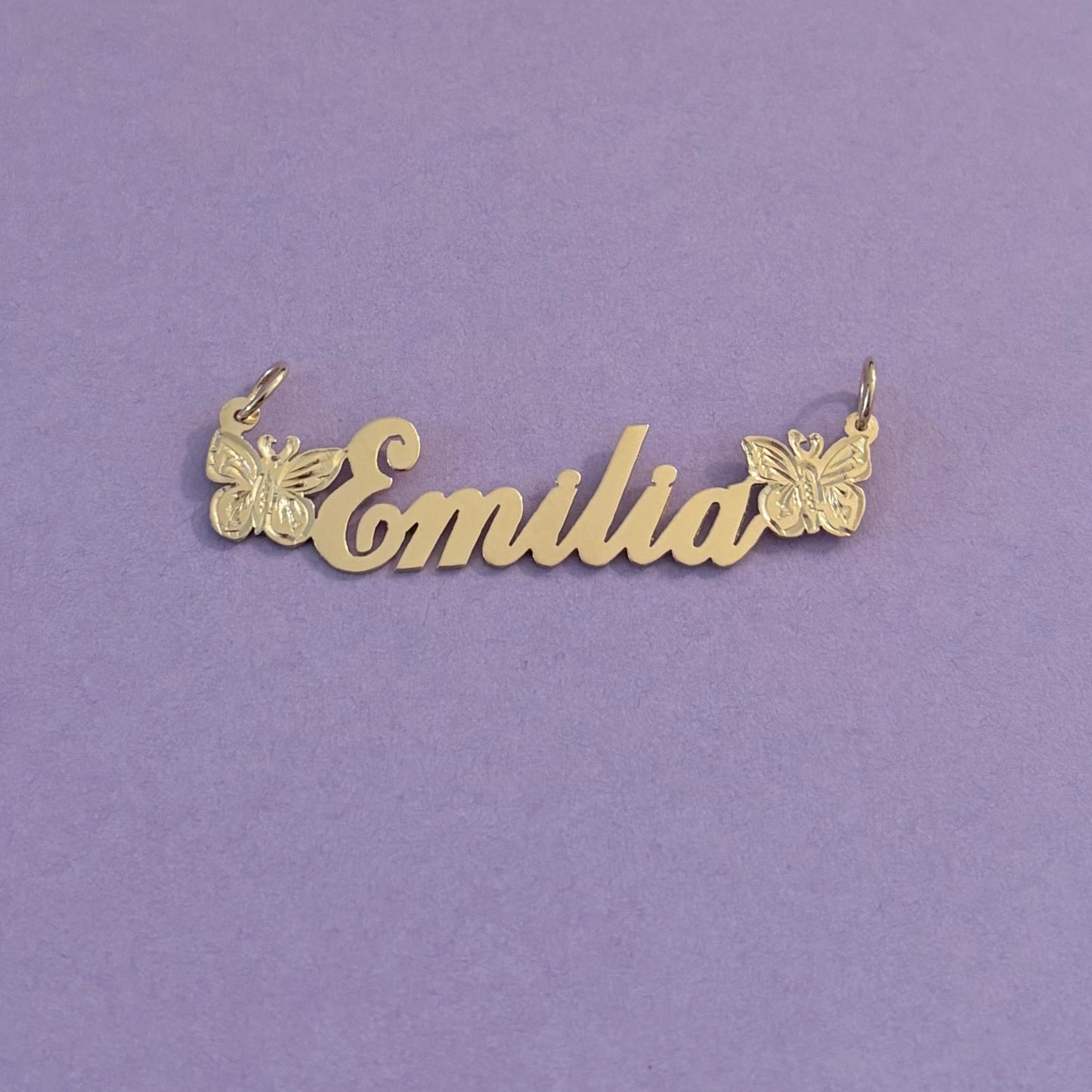 gold nameplate with butterflies