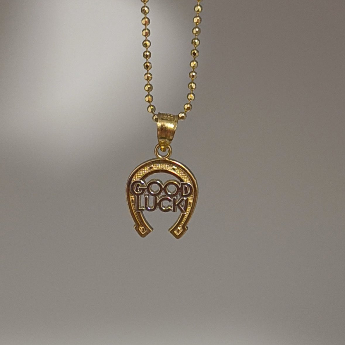 10k good luck horseshoe charm
