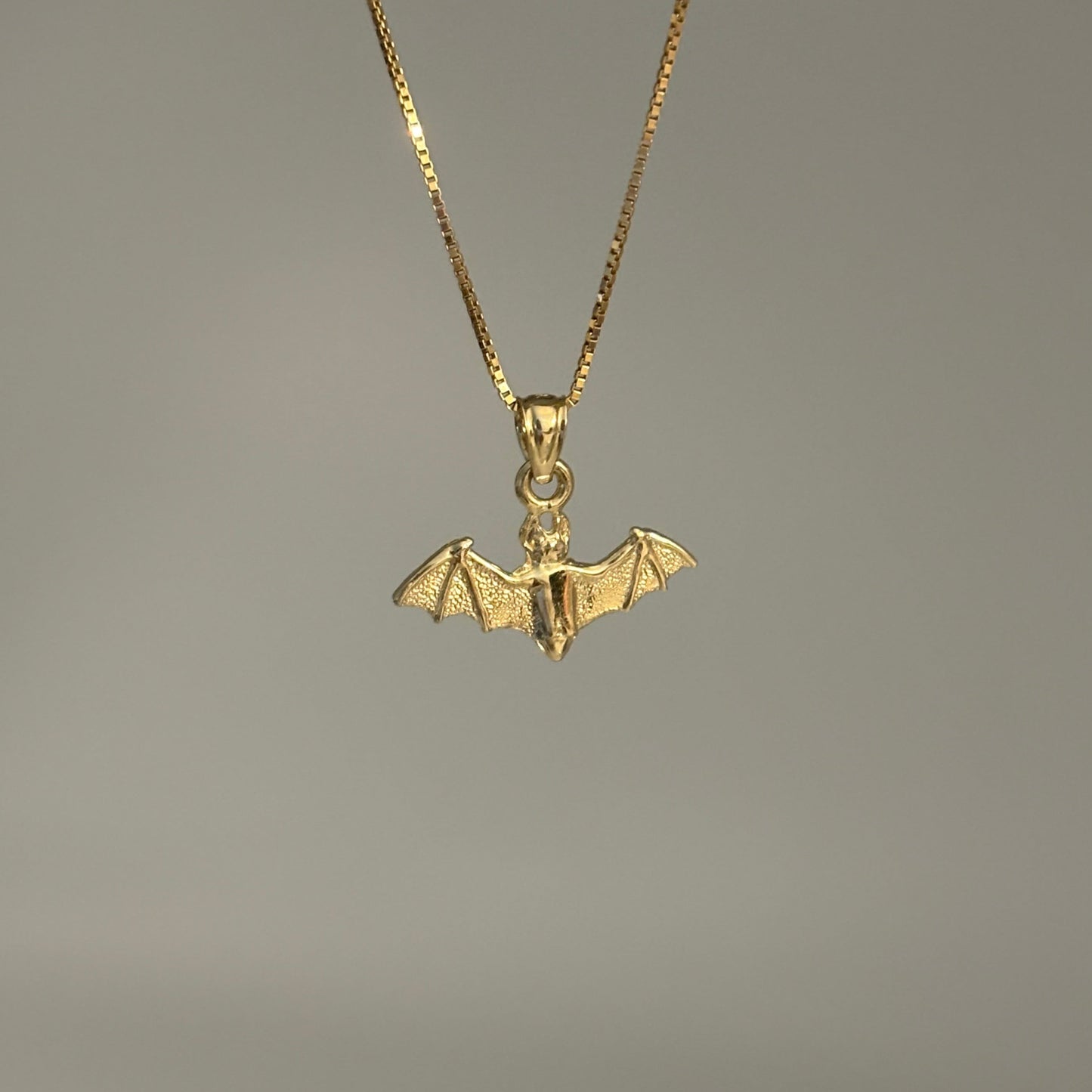 Solid yellow gold bat pendant, detailed Halloween jewelry charm