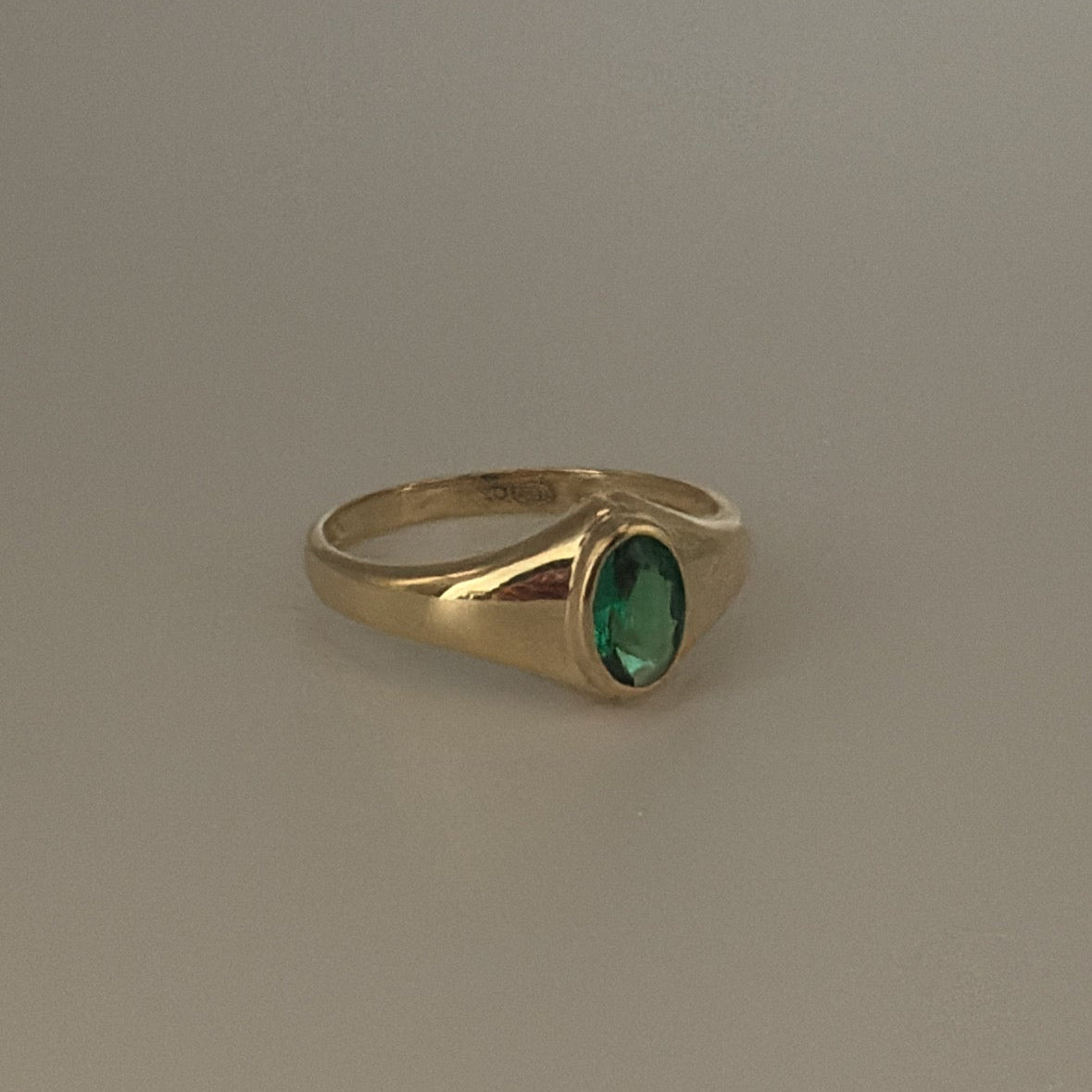 14K solid ring with green CZ