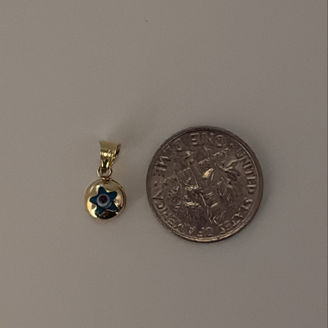 14k evil eye star charm