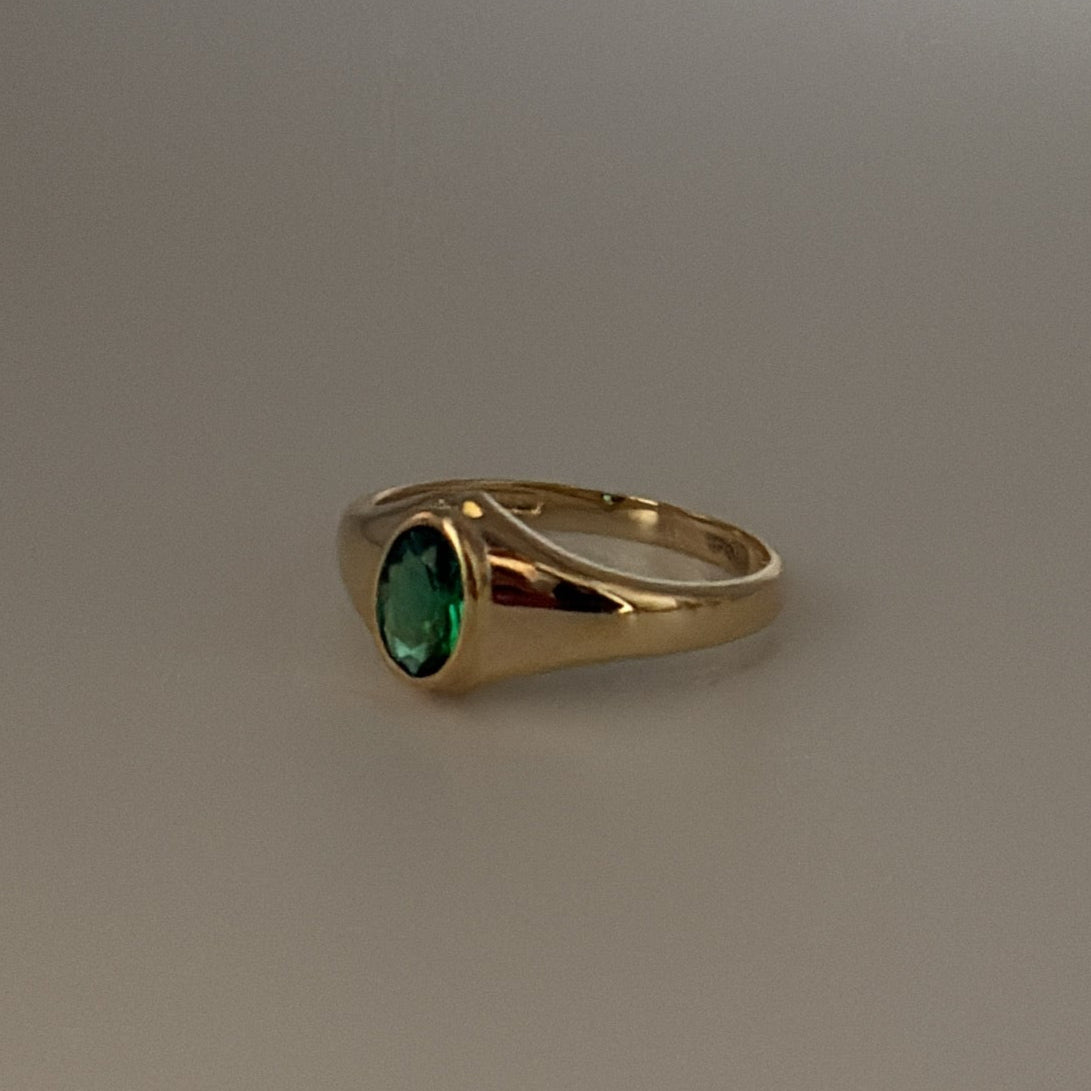 14K solid ring with green CZ