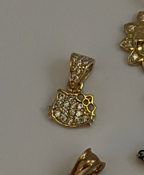 14k sun and kitty charm