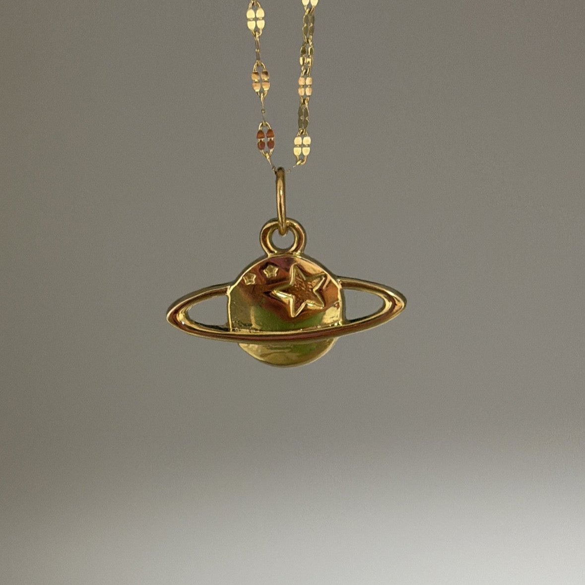 saturn charm