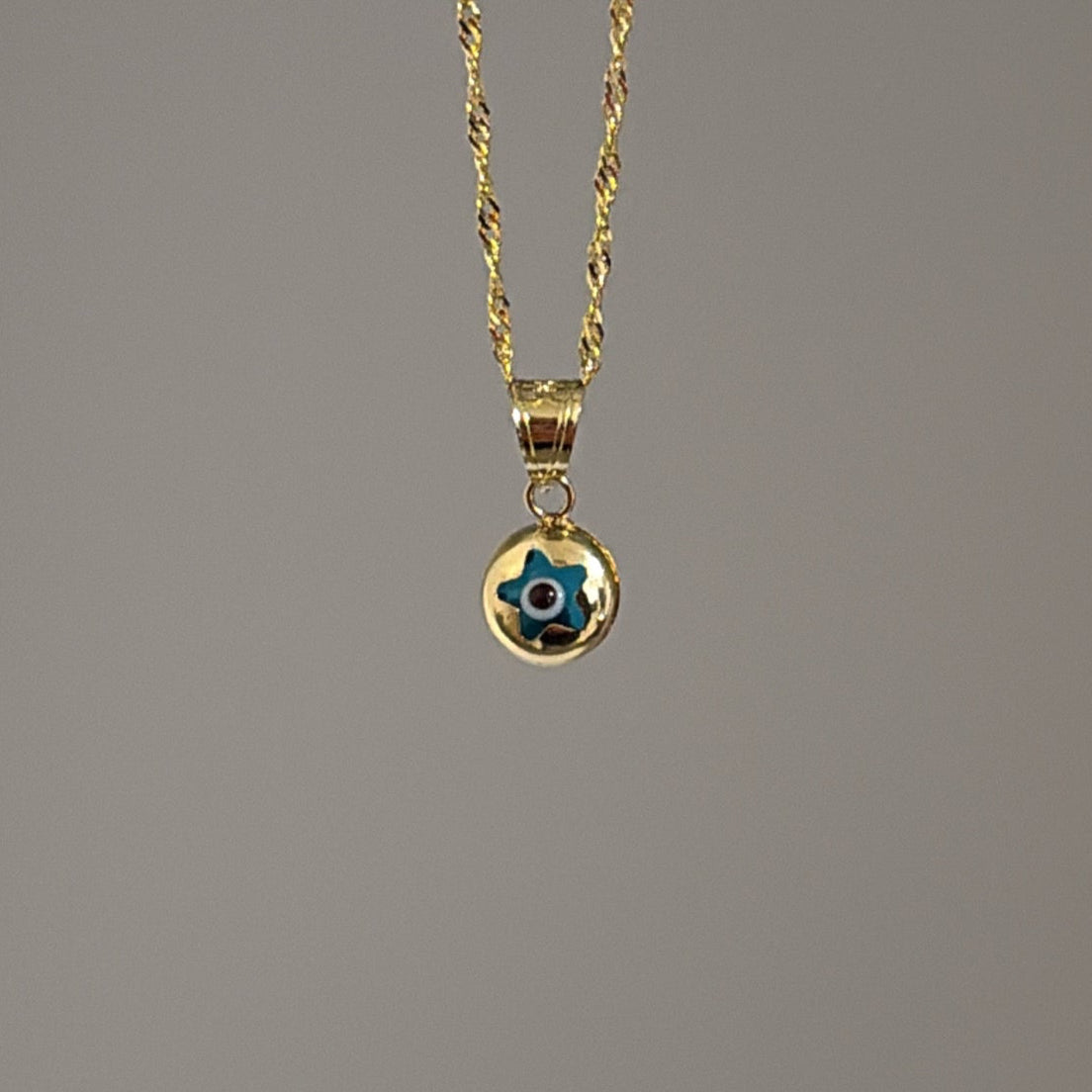 14k evil eye star charm