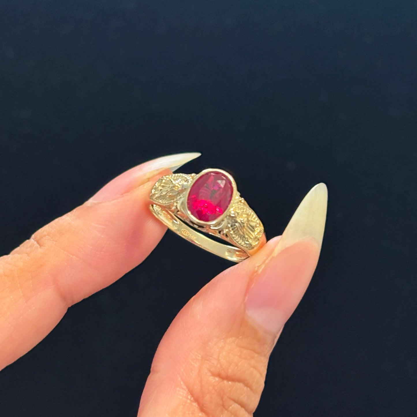 14k gold Virgencita ring with red CZ center stone