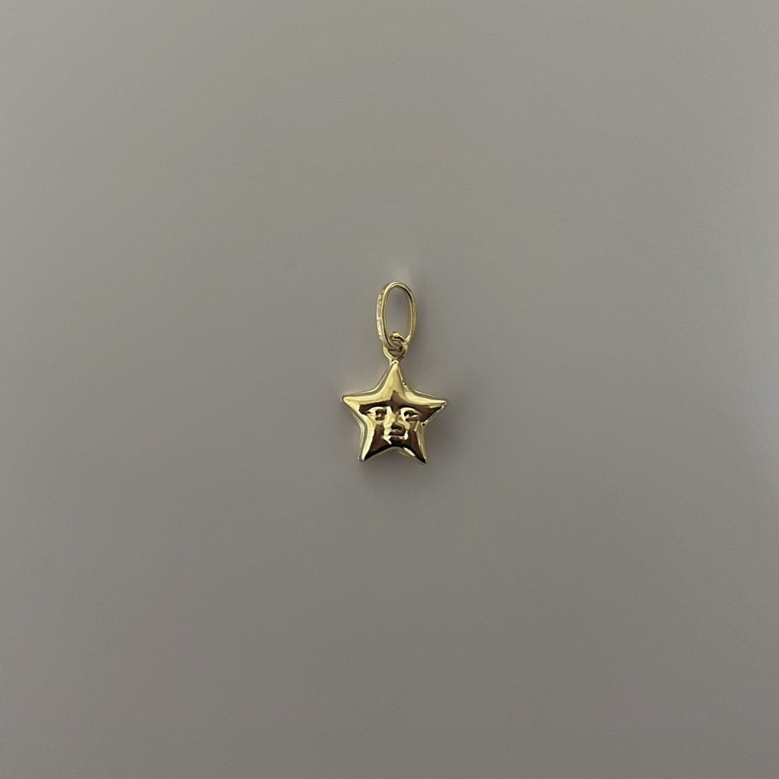 14k puffy star face charm
