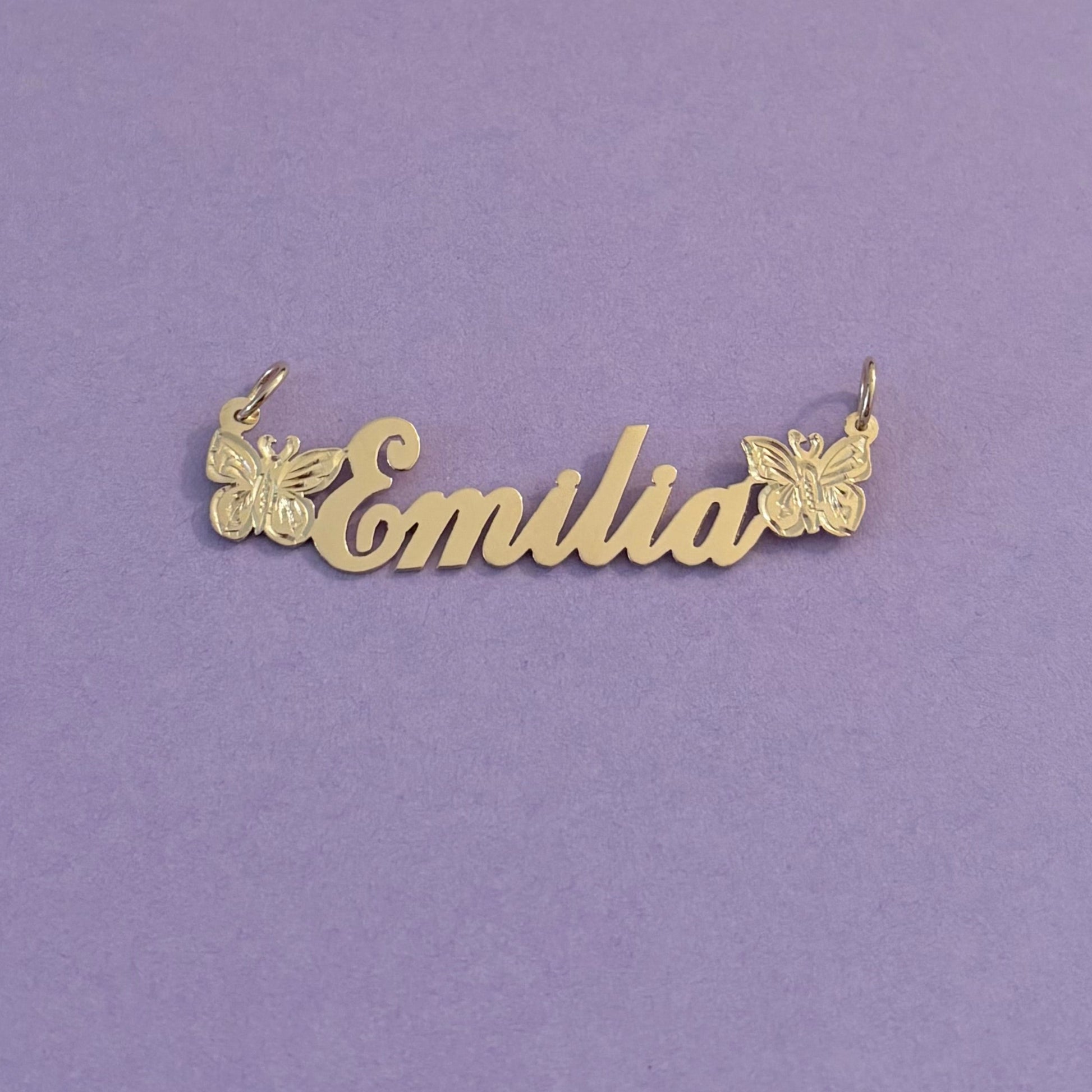 gold nameplate with butterflies 