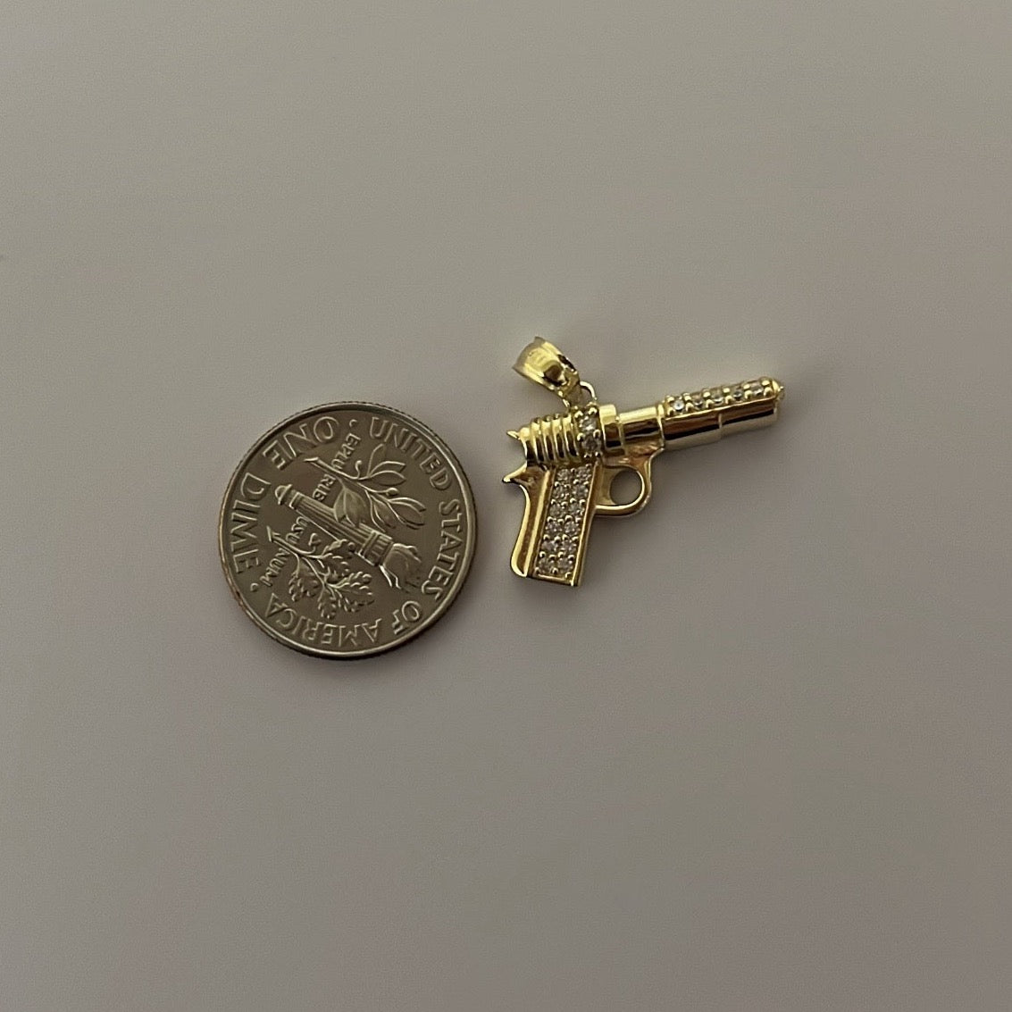 14K solid gold CZ gun charm