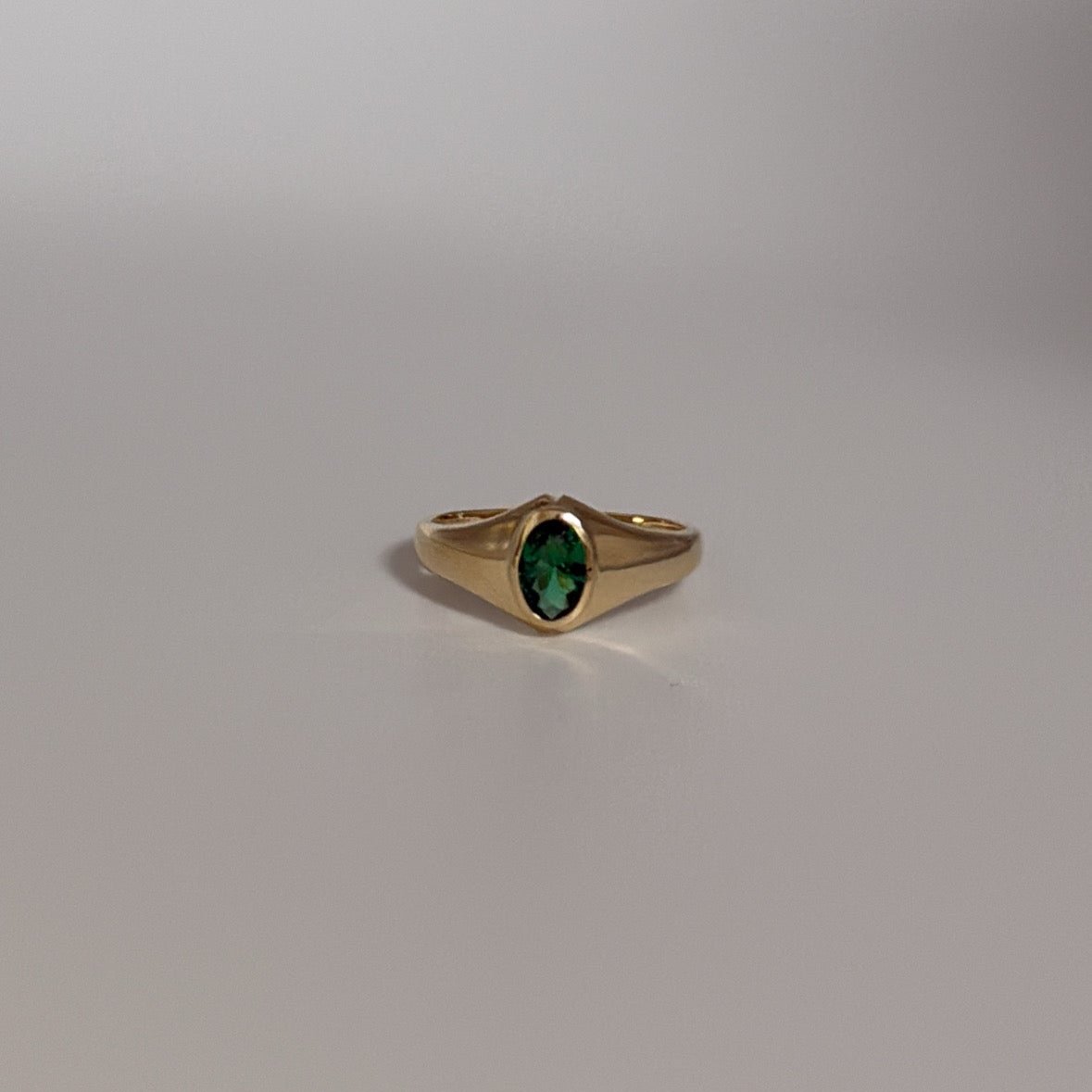 14K solid ring with green CZ