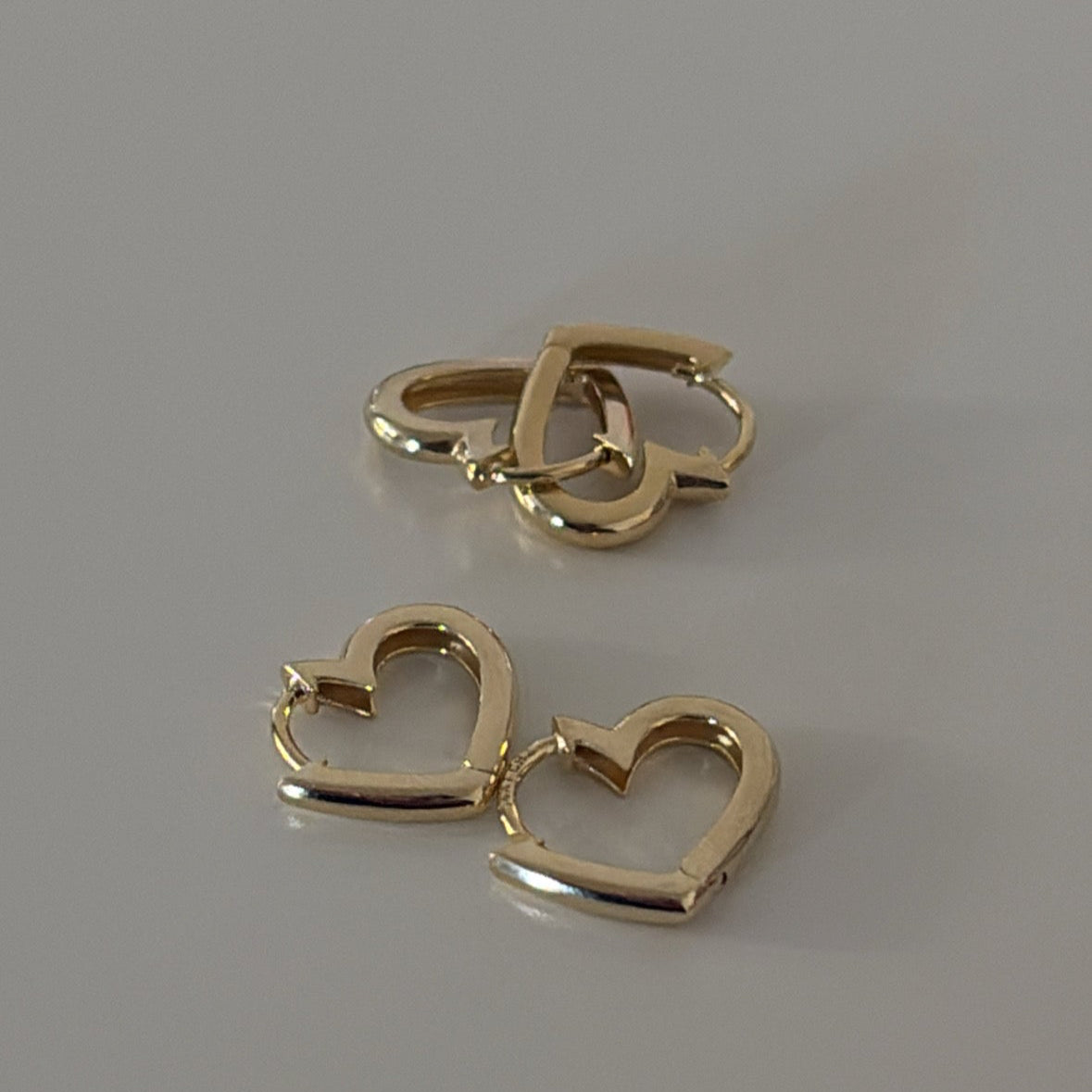 14k heart clicker earrings