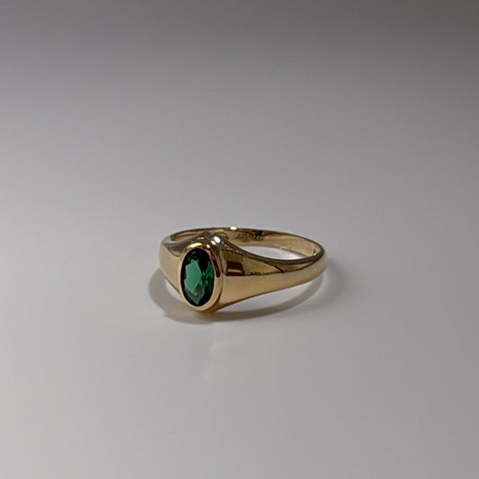 14K solid ring with green CZ