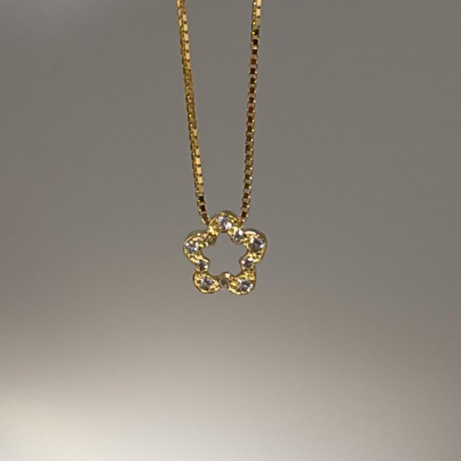 14k STAR/FLOWER necklace