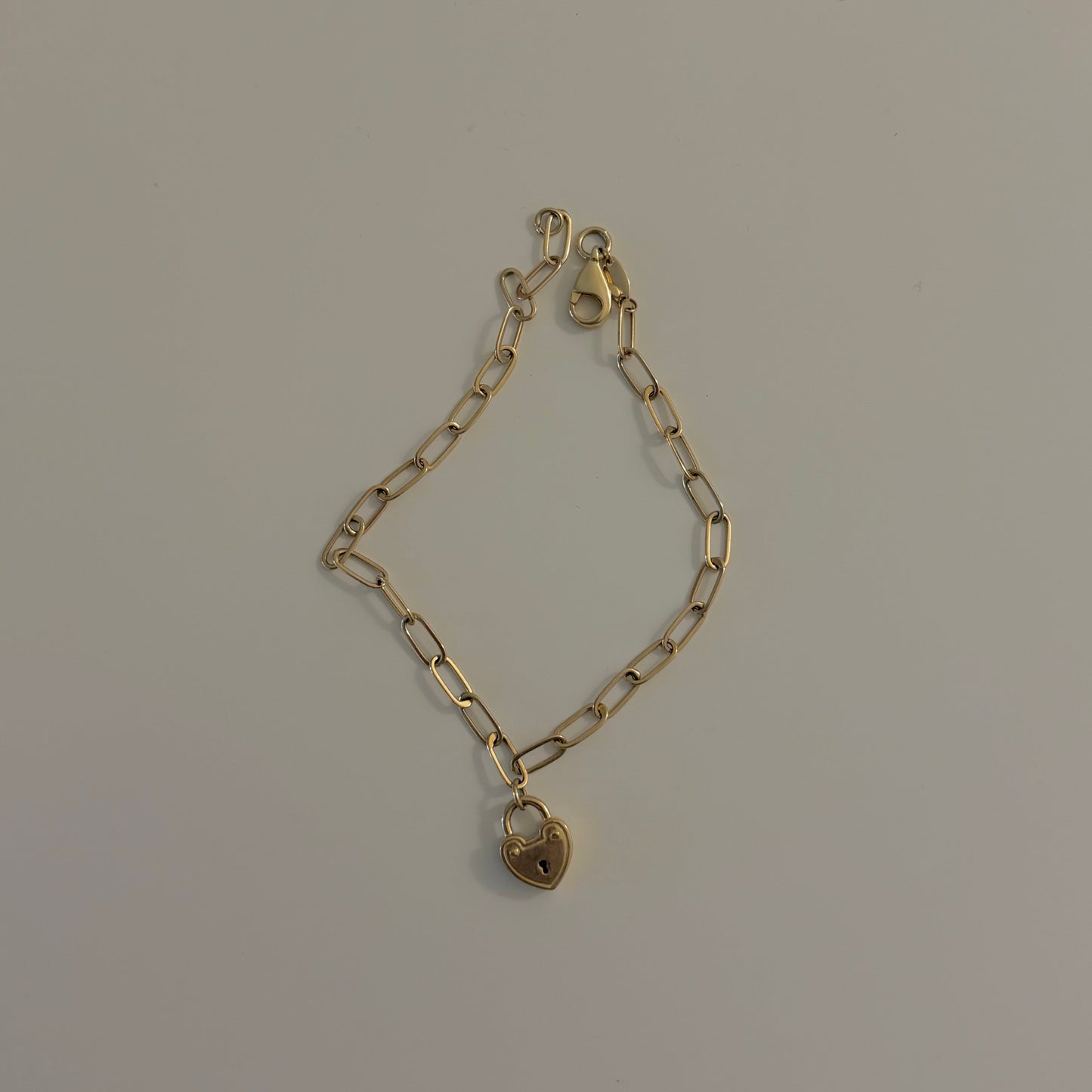 14K Yellow Gold Paperclip Bracelet with Heart Padlock Charm