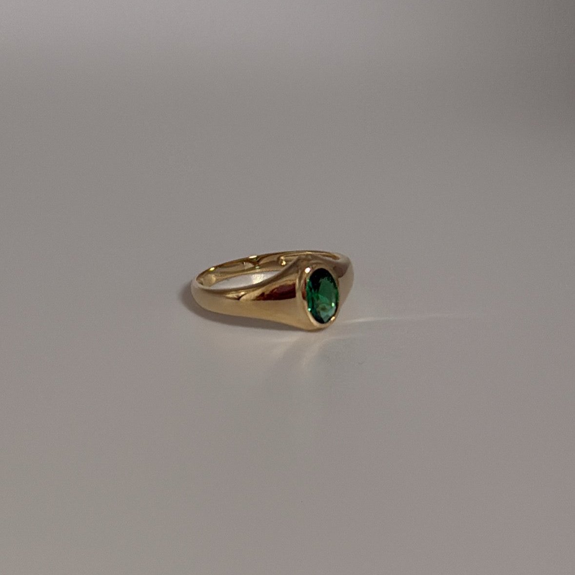 14K solid ring with green CZ