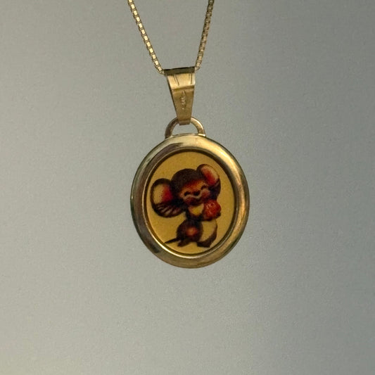 Vintage Italian 14K gold pendant featuring a mouse holding a strawberry, Italy 585.