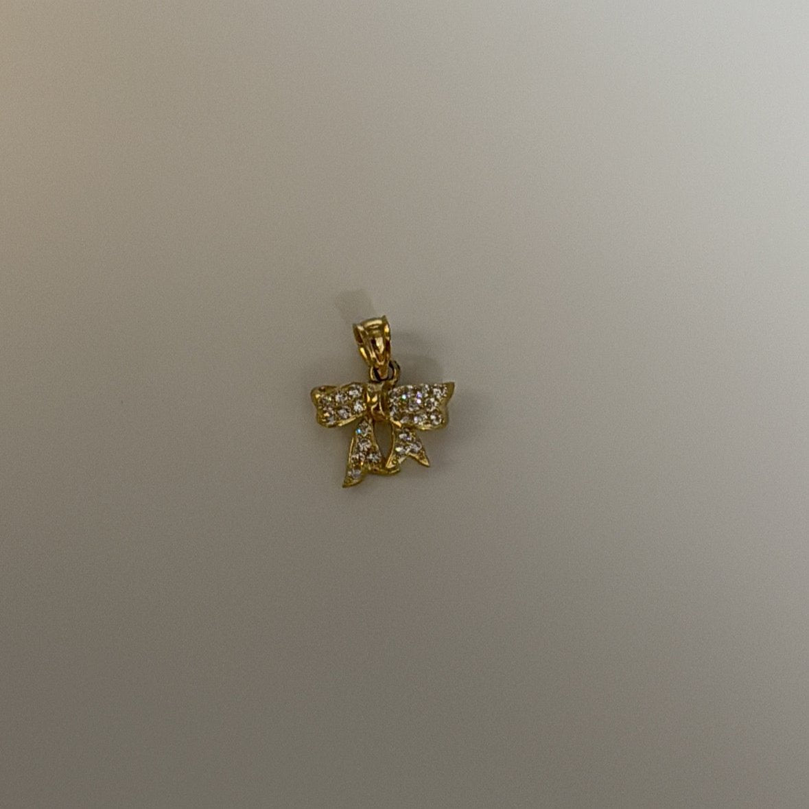 10K  gold CZ bow charm