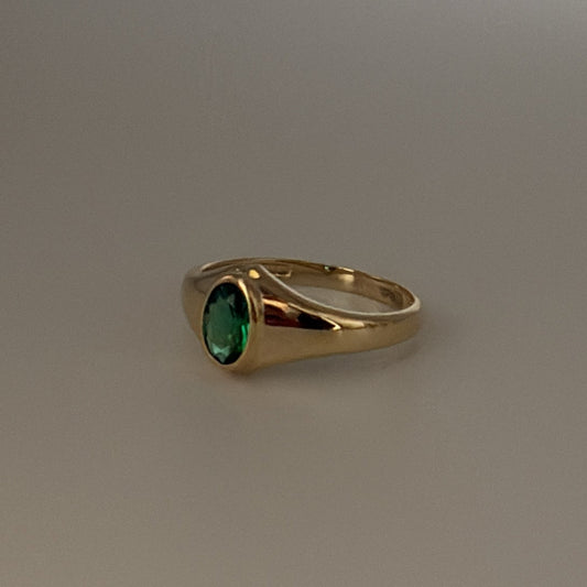 14K solid ring with green CZ