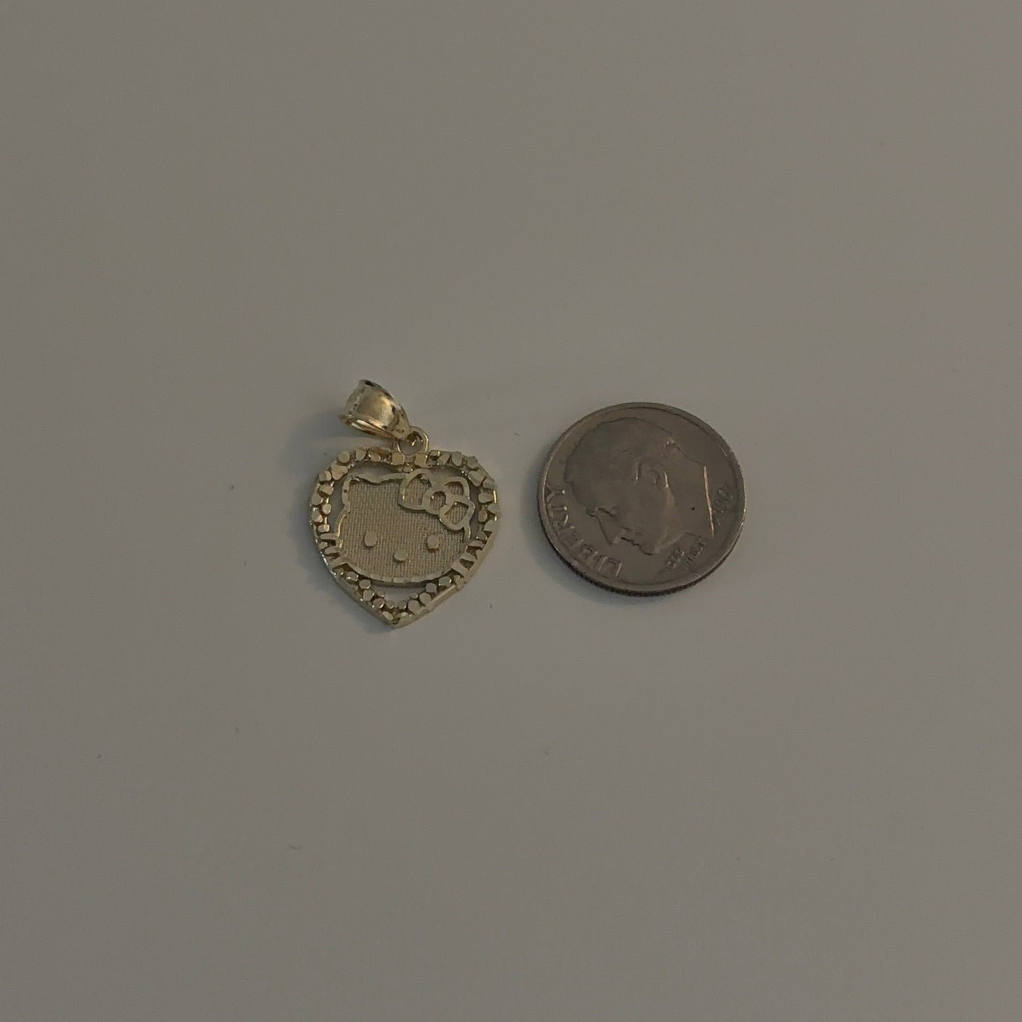 10k Gold hello kitty-inspired heart charm