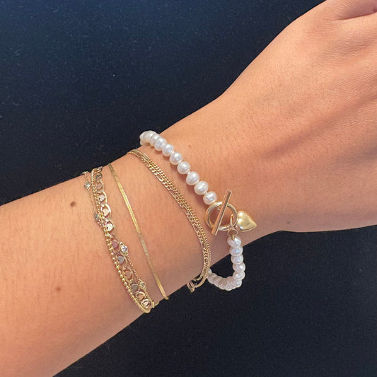 Vintage 14K gold bracelet with heart-shaped toggle clasp and baroque freshwater pearls 