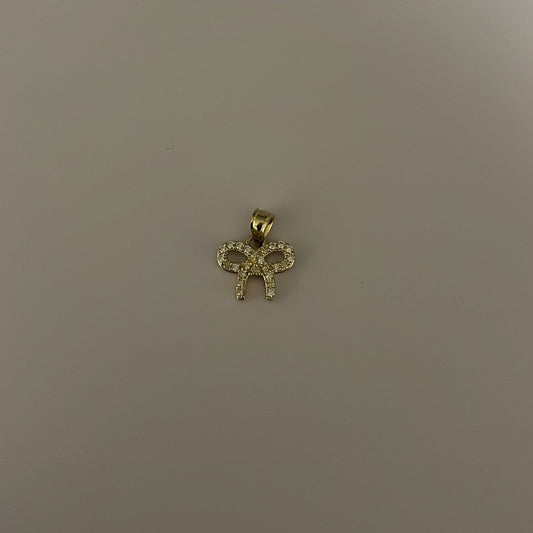 10K yellow solid gold CZ bow charm